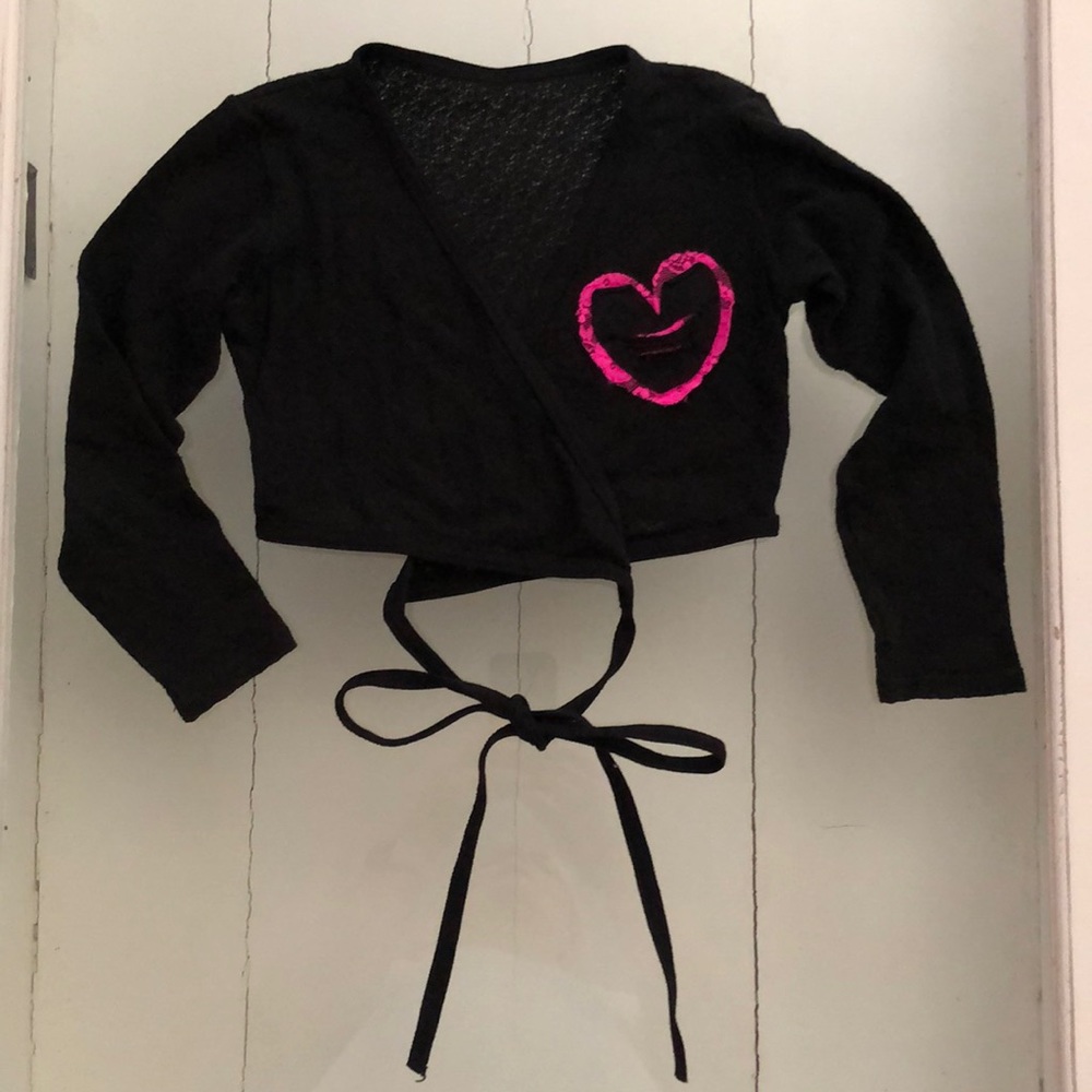 Motionwear. Black ballet sweater with pink heart.